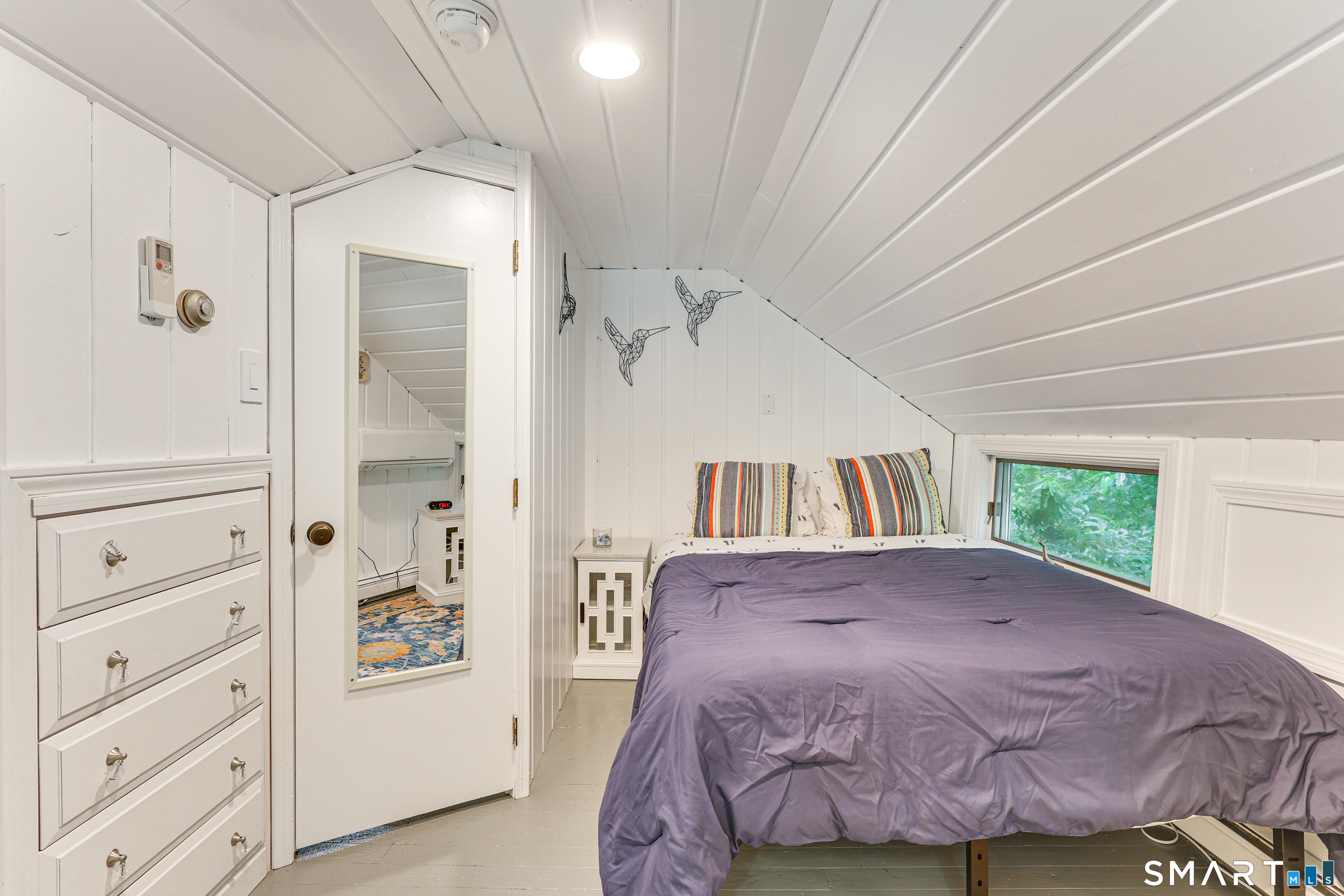 11 Stanton Street Waterford, CT 06385 - Photo 32 of 40 a bedroom with a bed and a window