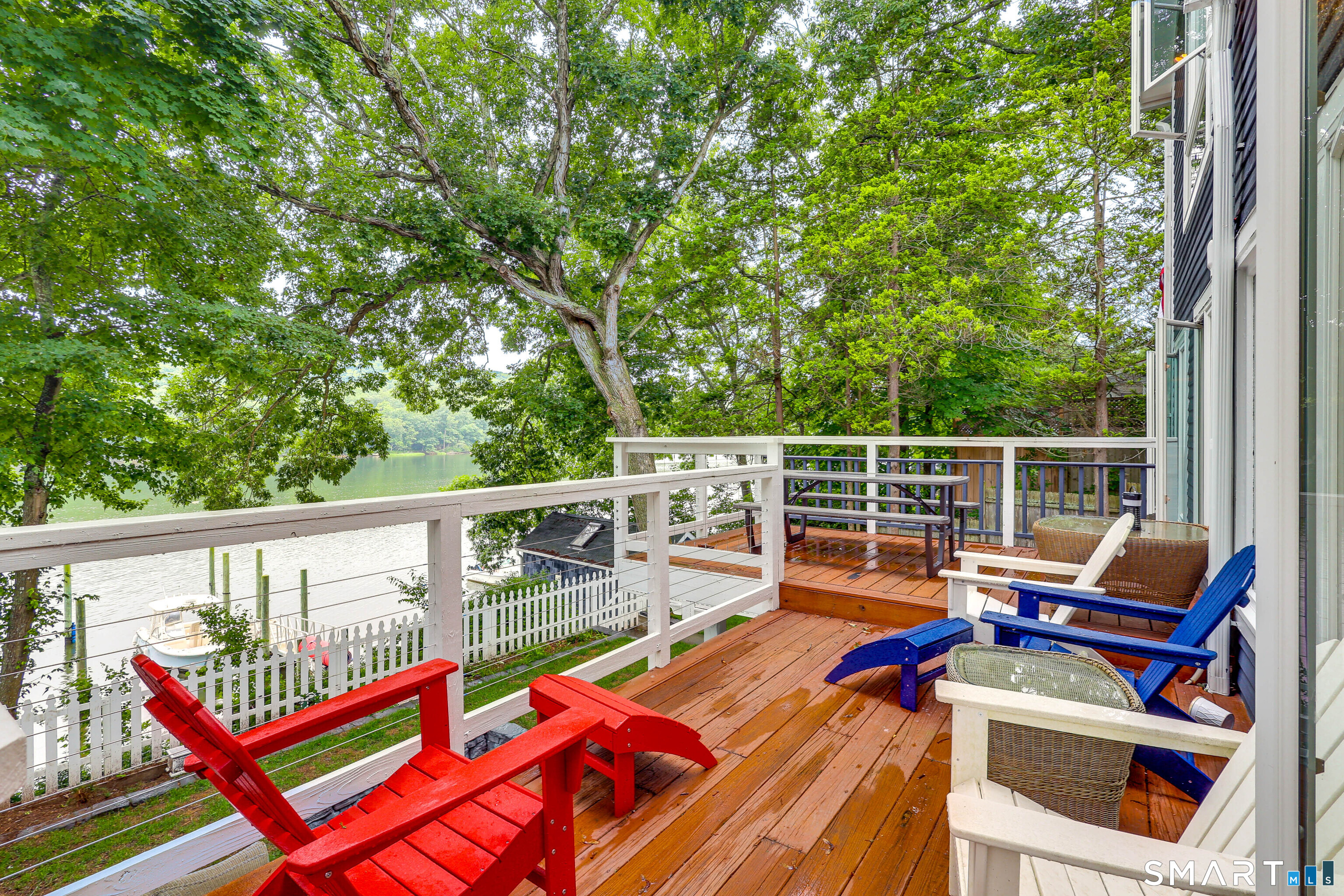 11 Stanton Street Waterford, CT 06385 - Photo 7 of 40 a view of a balcony with wooden floor and outdoor seating