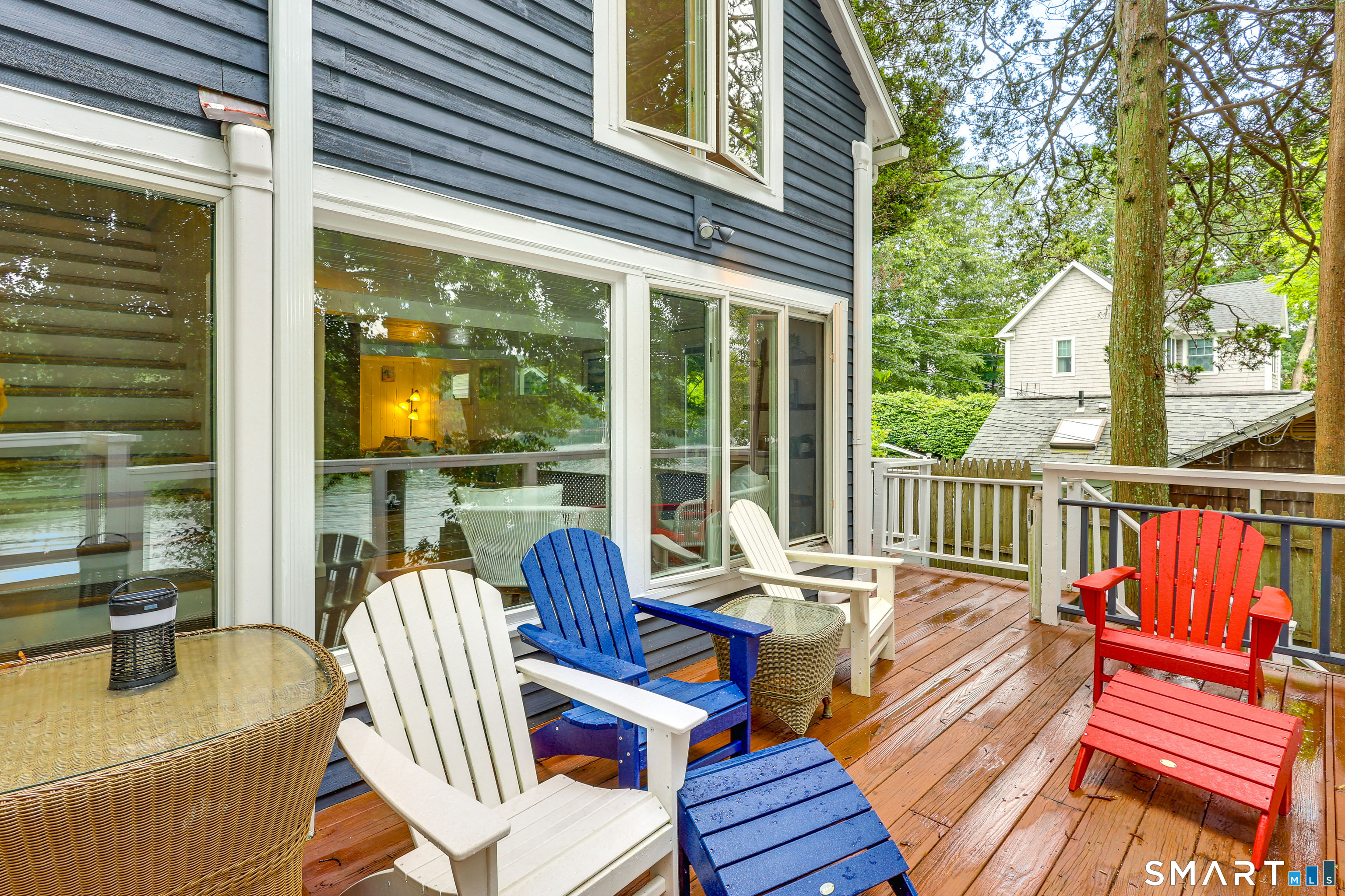 11 Stanton Street Waterford, CT 06385 - Photo 9 of 40 a view of a patio with couches chairs and wooden floor