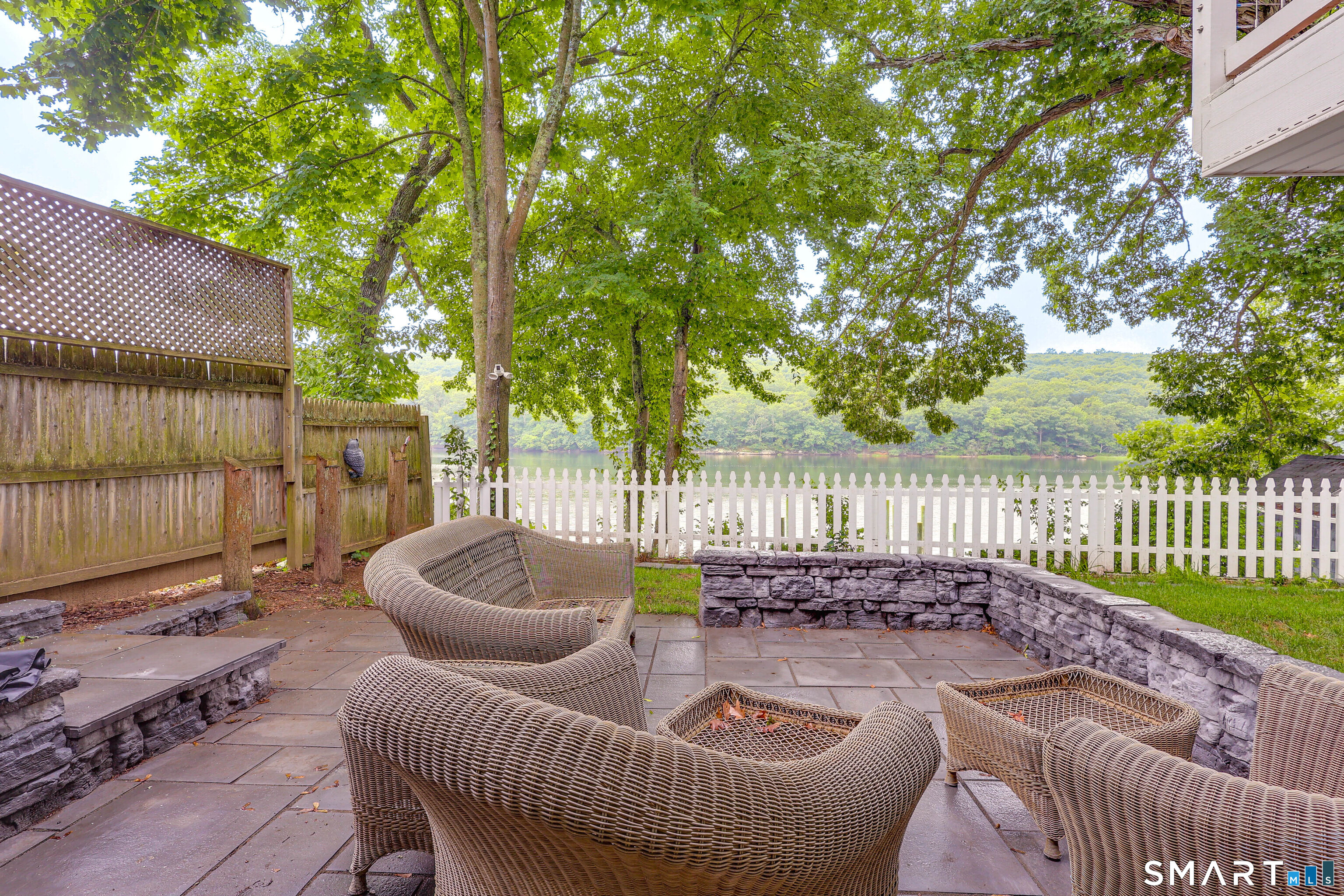 11 Stanton Street Waterford, CT 06385 - Photo 10 of 40 a balcony with chairs and a table