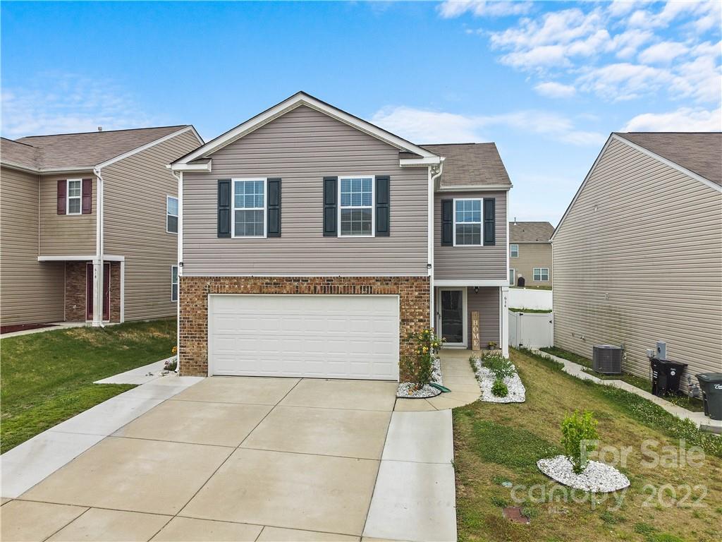 614 Shellbark Drive Concord, NC 28025 - Photo 1 of 30 a front view of house with yard