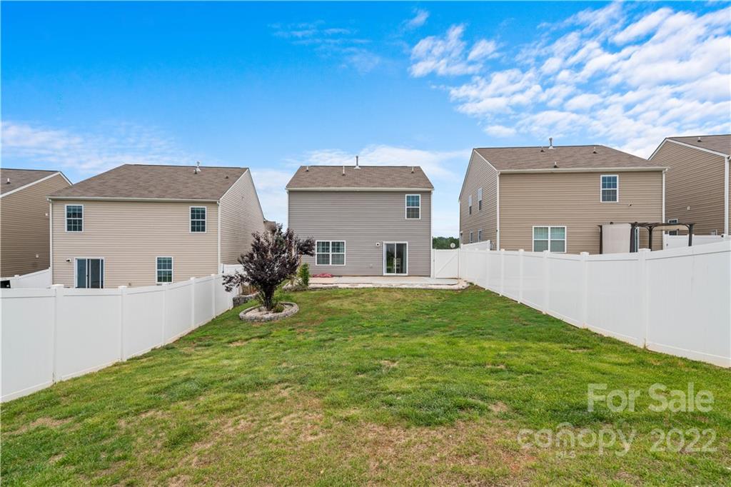 614 Shellbark Drive Concord, NC 28025 - Photo 27 of 30 a house view with a garden space