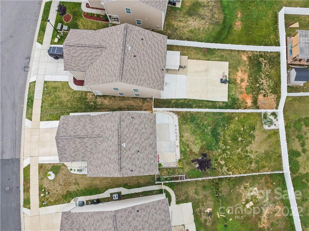 614 Shellbark Drive Concord, NC 28025 - Photo 30 of 30 an aerial view of a house with a yard