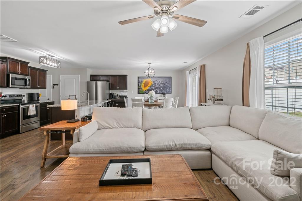 614 Shellbark Drive Concord, NC 28025 - Photo 6 of 30 a living room with furniture kitchen view and a window