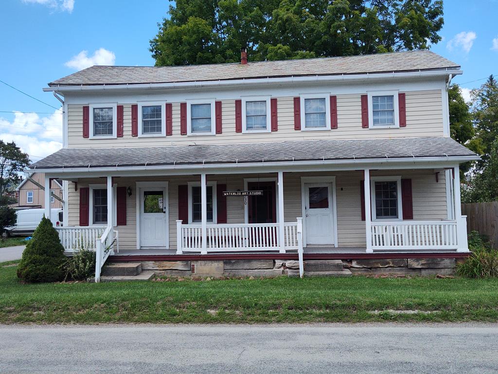730 Main Street Polk, PA 16342 - Photo 1 of 43 a house that has lot of windows in it