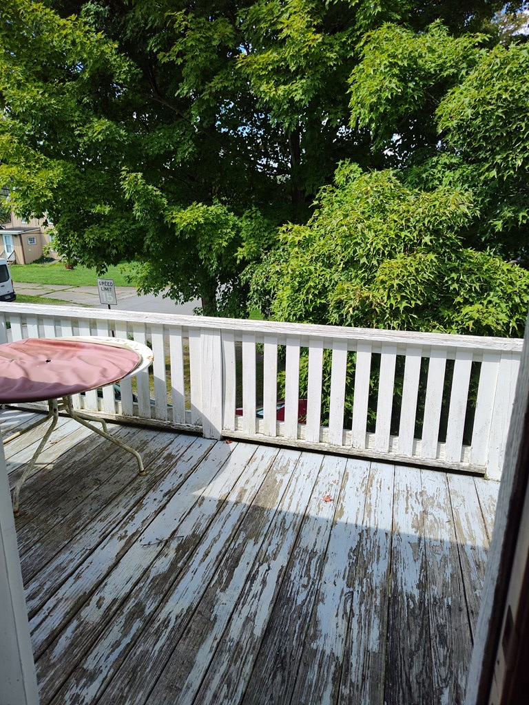 730 Main Street Polk, PA 16342 - Photo 11 of 43 a view of a wooden deck