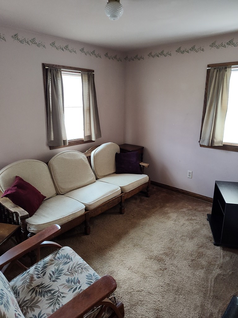 730 Main Street Polk, PA 16342 - Photo 13 of 43 a living room with furniture and a window