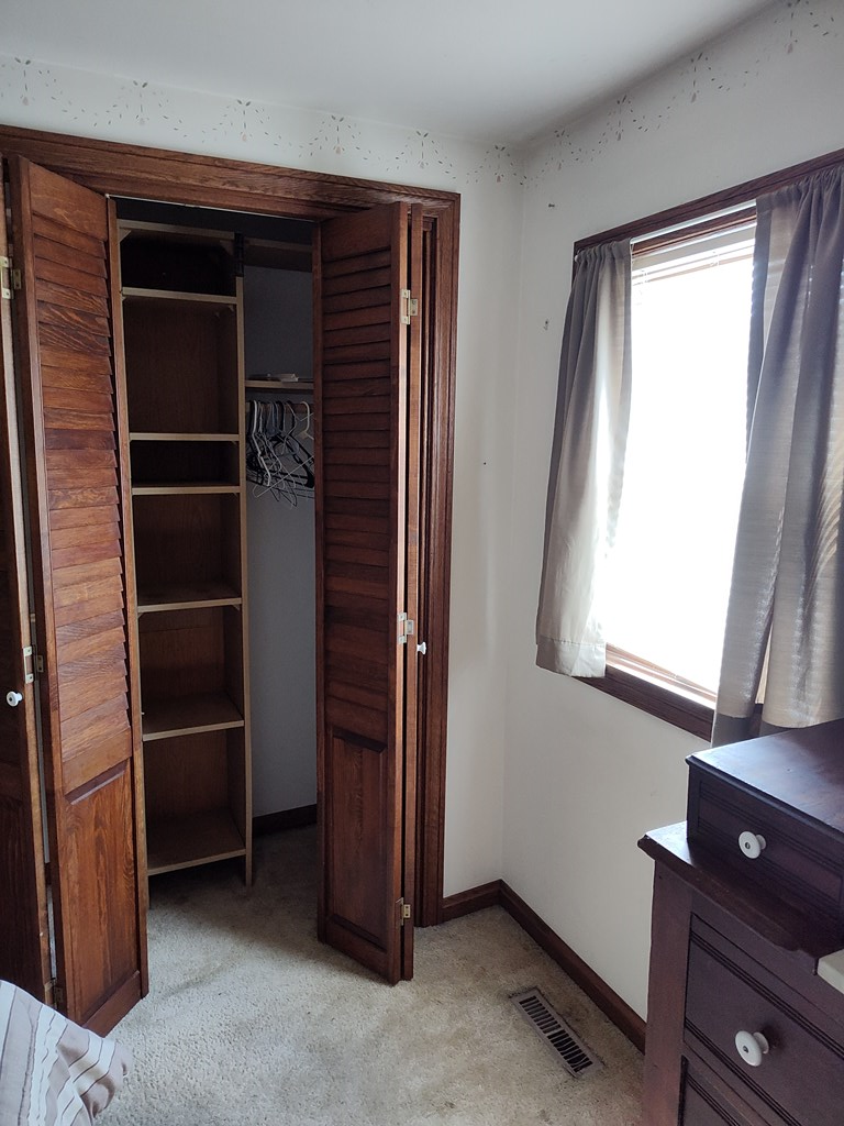 730 Main Street Polk, PA 16342 - Photo 14 of 43 a view of an empty room with a window