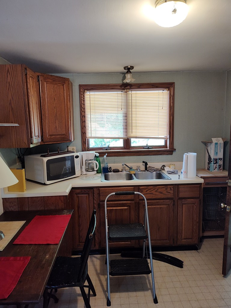 730 Main Street Polk, PA 16342 - Photo 16 of 43 a kitchen with a sink cabinets and window