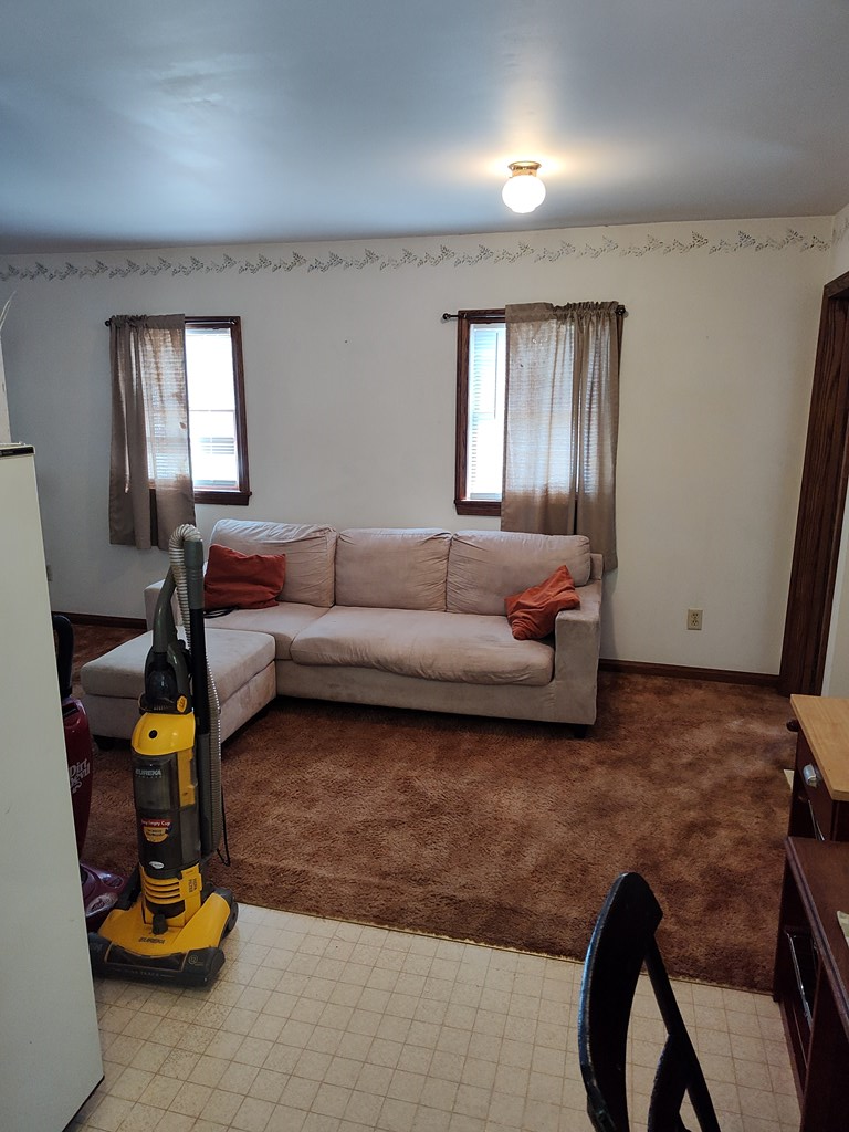 730 Main Street Polk, PA 16342 - Photo 25 of 43 a living room with furniture a window and gym equipment