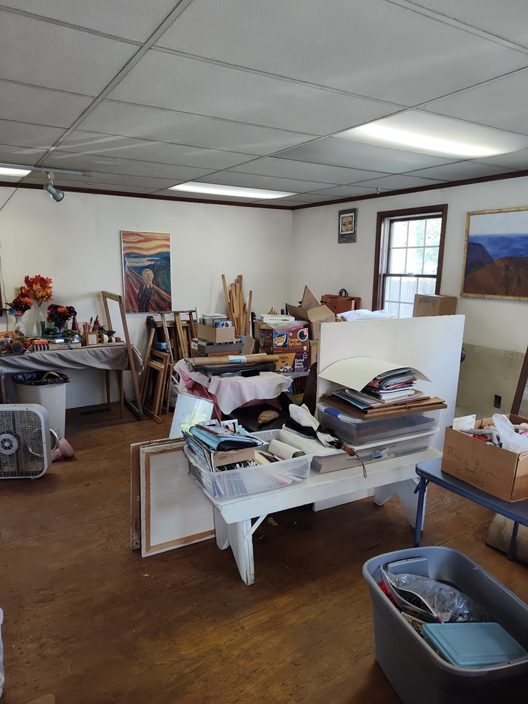 730 Main Street Polk, PA 16342 - Photo 3 of 43 a living room with furniture gym equipment and a window