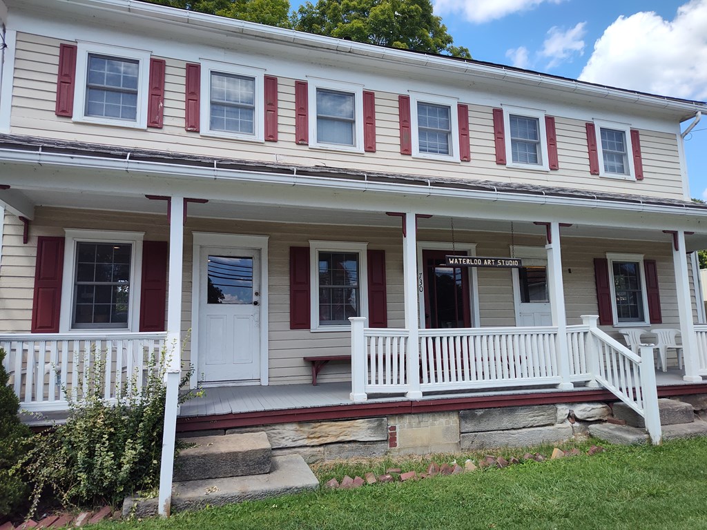 730 Main Street Polk, PA 16342 - Photo 32 of 43 front view of a house with a porch