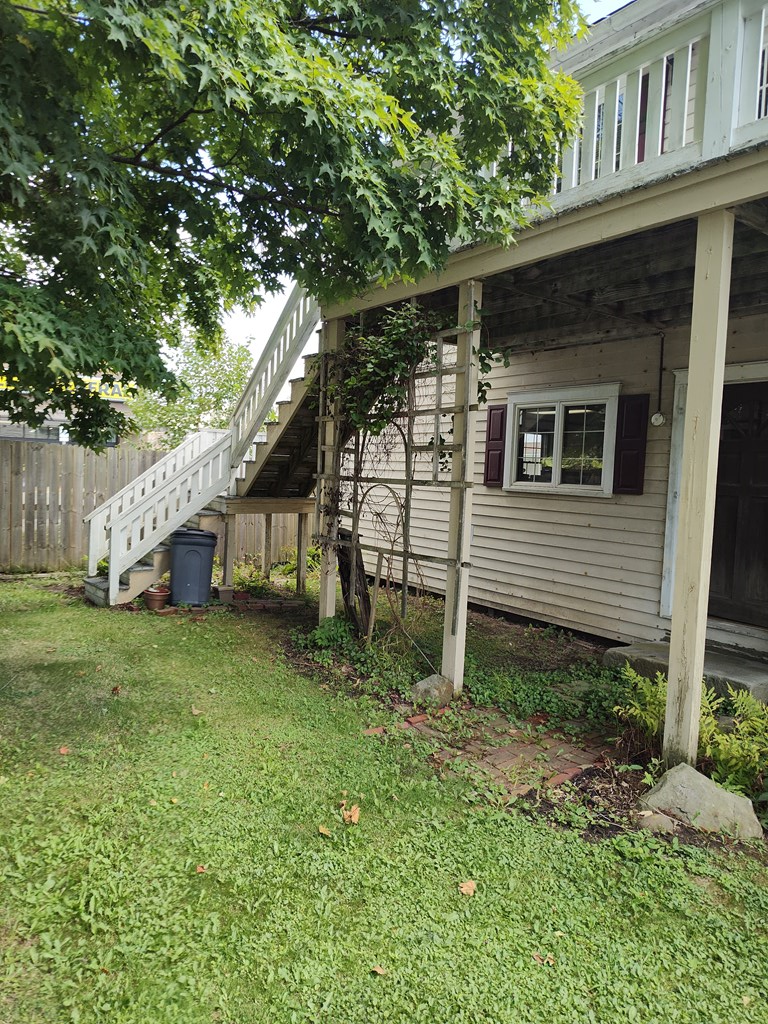 730 Main Street Polk, PA 16342 - Photo 35 of 43 a backyard of a house with plants and large tree