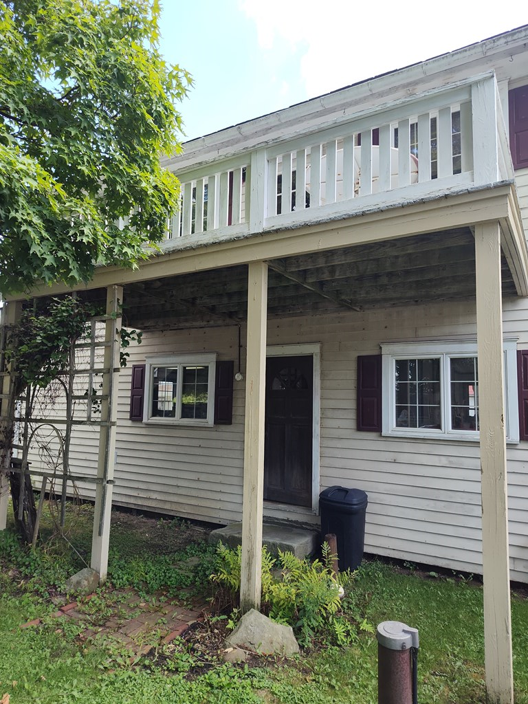 730 Main Street Polk, PA 16342 - Photo 36 of 43 a front view of a house with garden