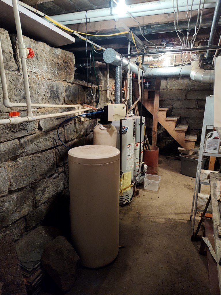 730 Main Street Polk, PA 16342 - Photo 39 of 43 a utility room with dryer washer and other items