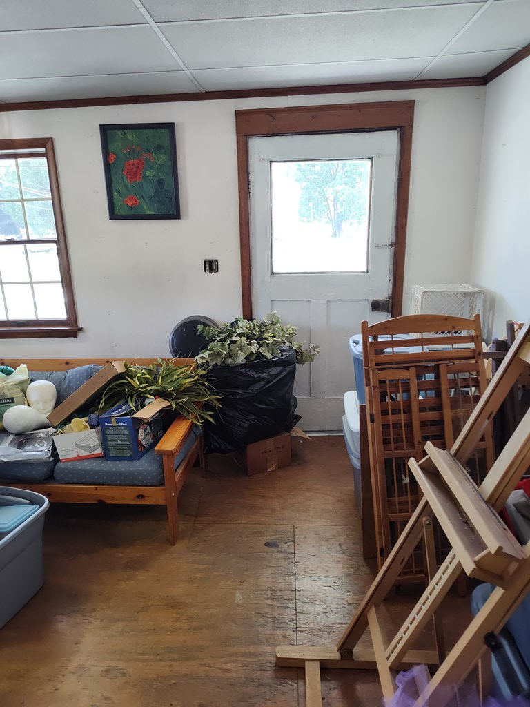 730 Main Street Polk, PA 16342 - Photo 5 of 43 a living room with furniture a window and a flat screen tv