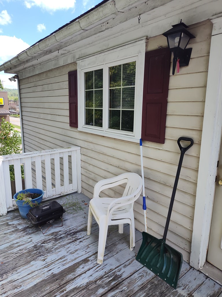 730 Main Street Polk, PA 16342 - Photo 9 of 43 a view of a deck with a chair