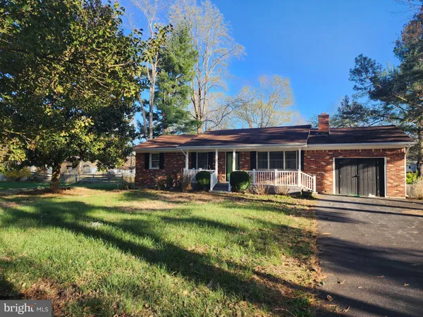 front view of a house with swimming pool