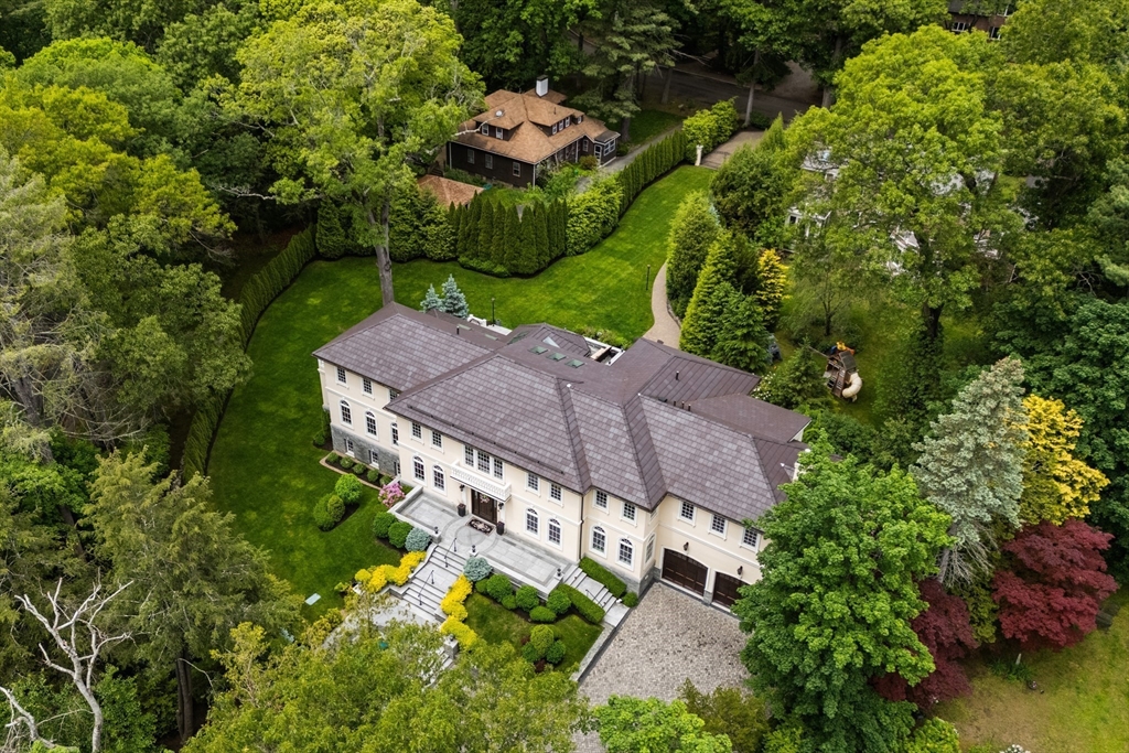 an aerial view of a house with a garden