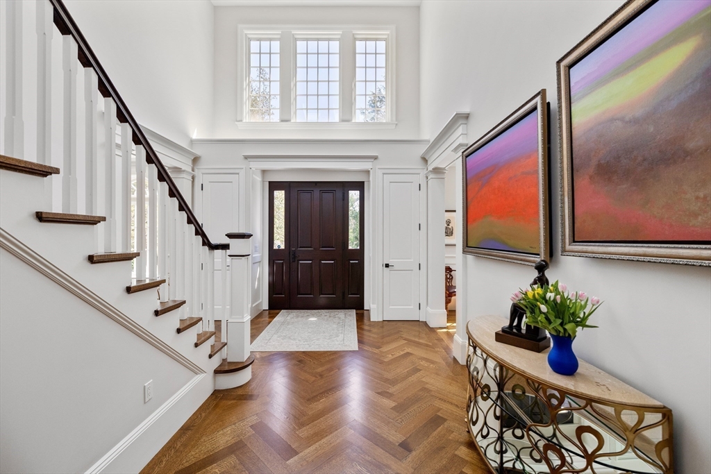 37 Radcliff Road Newton, MA 02468 - Photo 16 of 40 a view of entryway and hall with wooden floor