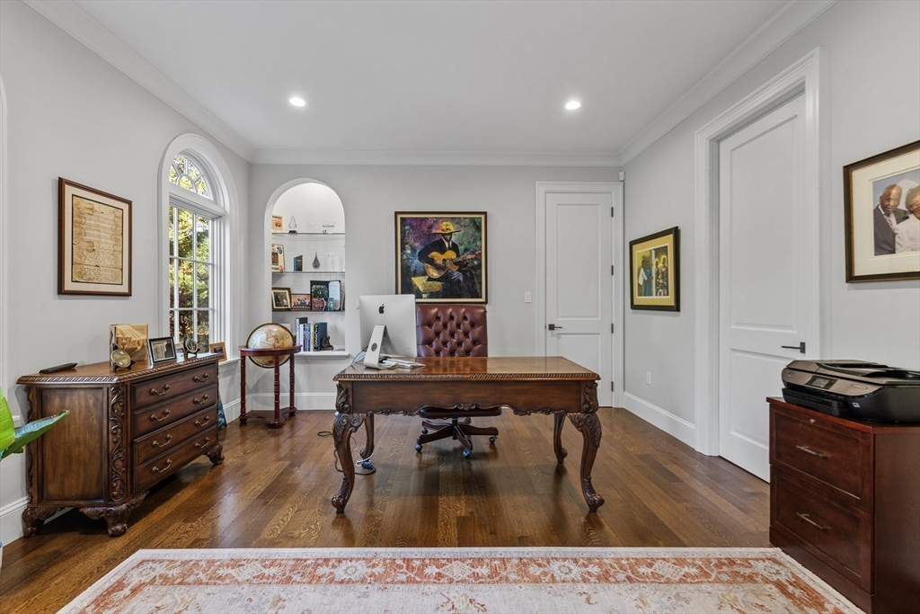 37 Radcliff Road Newton, MA 02468 - Photo 19 of 40 a living room with furniture and a dining table