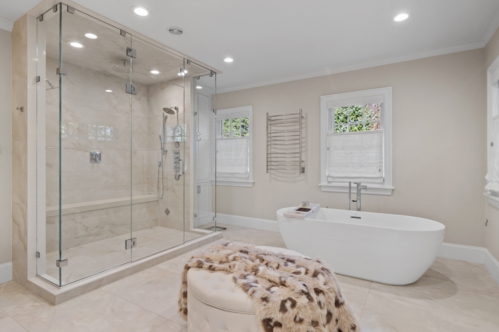 37 Radcliff Road Newton, MA 02468 - Photo 23 of 40 a bathroom with a bathtub and a shower