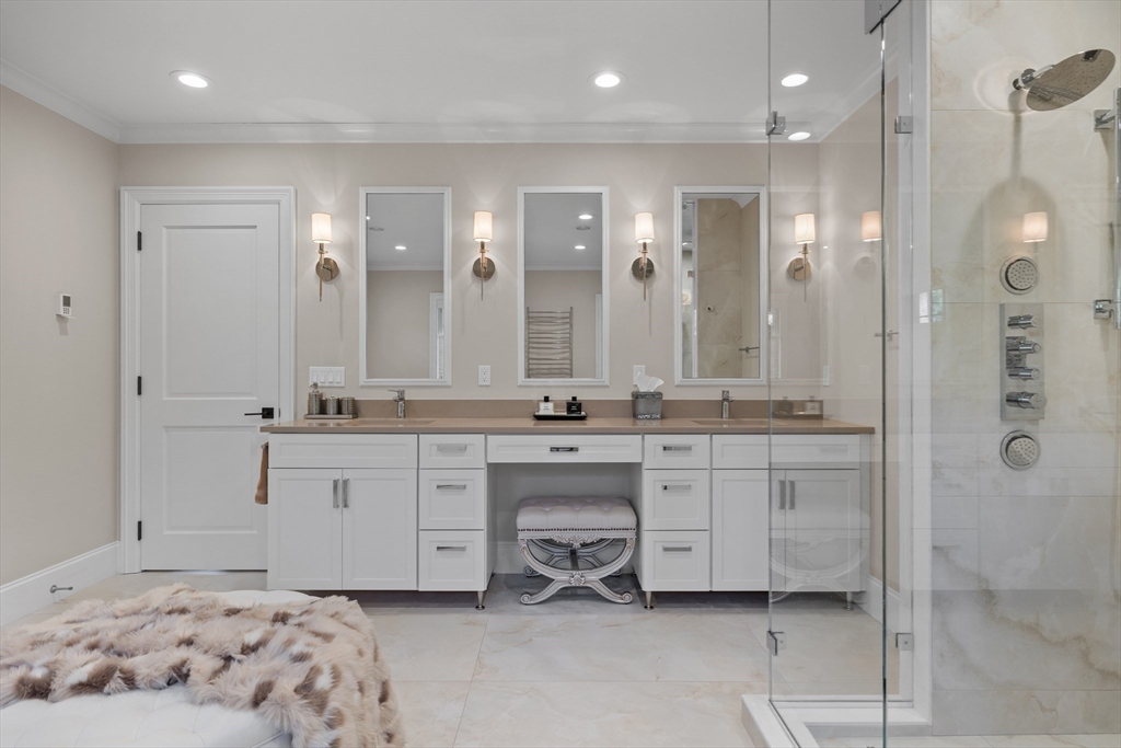 37 Radcliff Road Newton, MA 02468 - Photo 25 of 40 a spacious bathroom with a mirror a sink and a shower