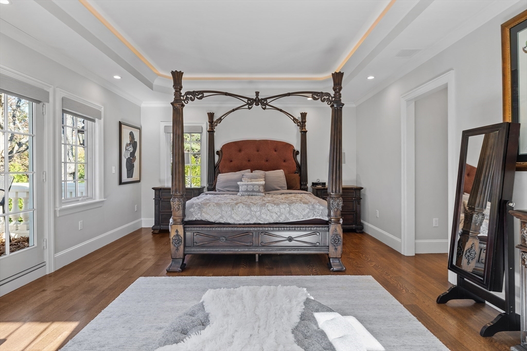 37 Radcliff Road Newton, MA 02468 - Photo 27 of 40 a bedroom with a bed and wooden floor