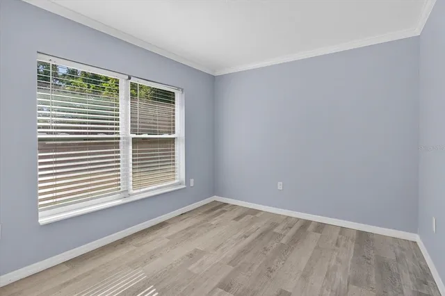 a view of a house with sitting area and garden