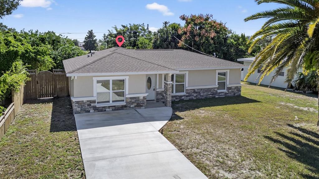 5352 Tangerine Drive New Port Richey, FL 34652 - Photo 57 of 76 a view of a house with sitting area and garden