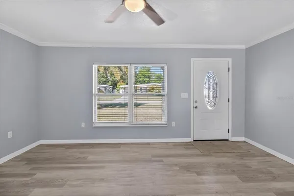 a kitchen with stainless steel appliances granite countertop a sink stove and microwave