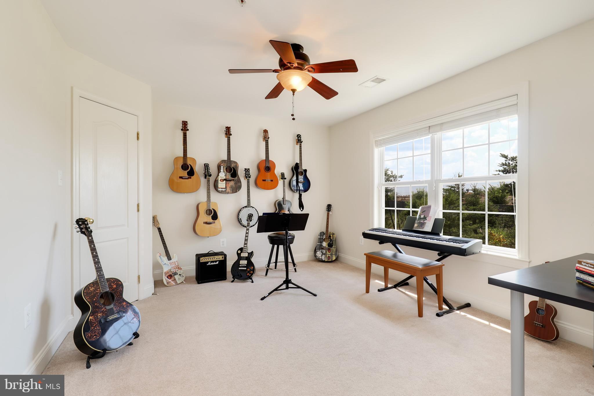 6905 Ironbridge Lane Laurel, MD 20707 - Photo 14 of 30 a view of a room with gym equipment