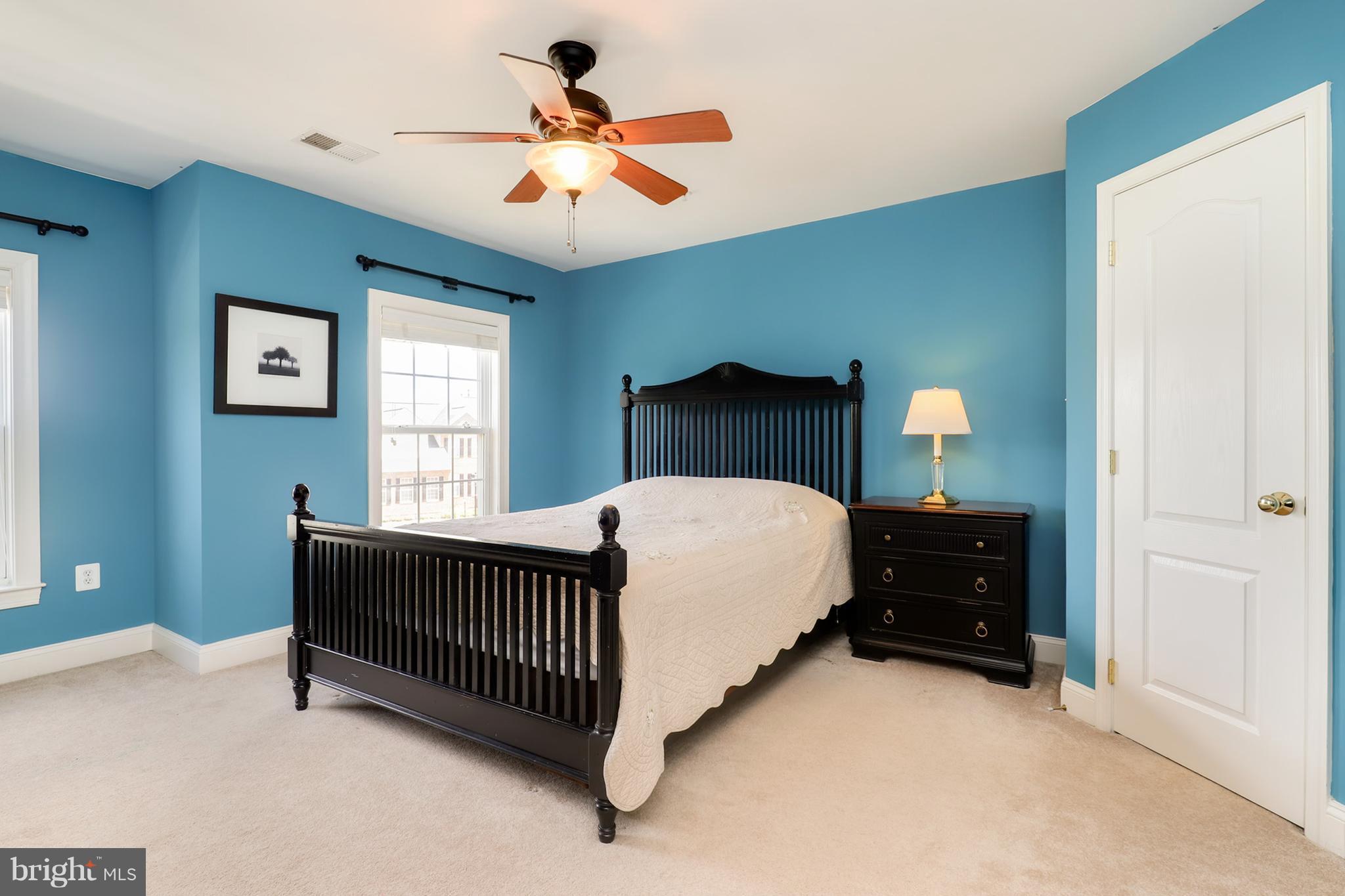 6905 Ironbridge Lane Laurel, MD 20707 - Photo 15 of 30 a bedroom with a bed and a window