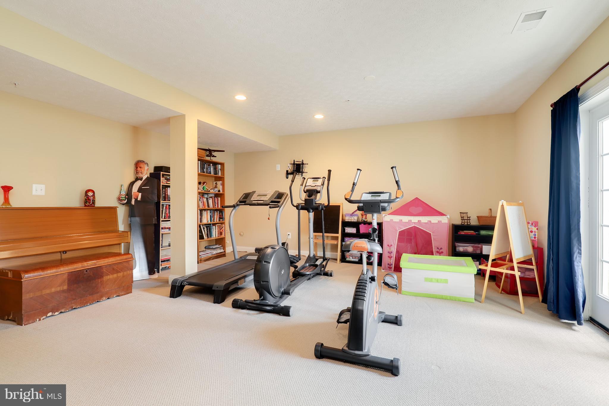 6905 Ironbridge Lane Laurel, MD 20707 - Photo 23 of 30 a view of a room with gym equipment