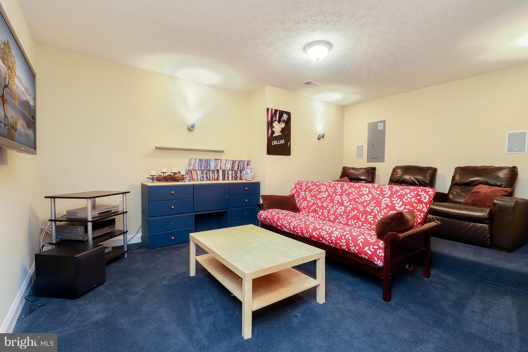 6905 Ironbridge Lane Laurel, MD 20707 - Photo 25 of 30 a living room with furniture and a couch