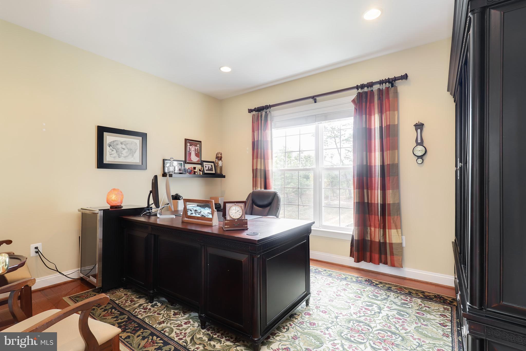 6905 Ironbridge Lane Laurel, MD 20707 - Photo 6 of 30 a dining room with table and chair