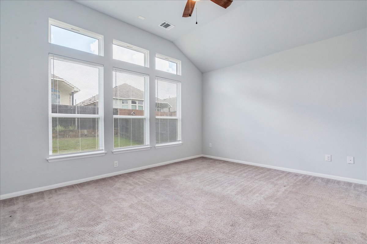 275 Cherrystone Loop Buda, TX 78610 - Photo 17 of 33 Primary bedroom