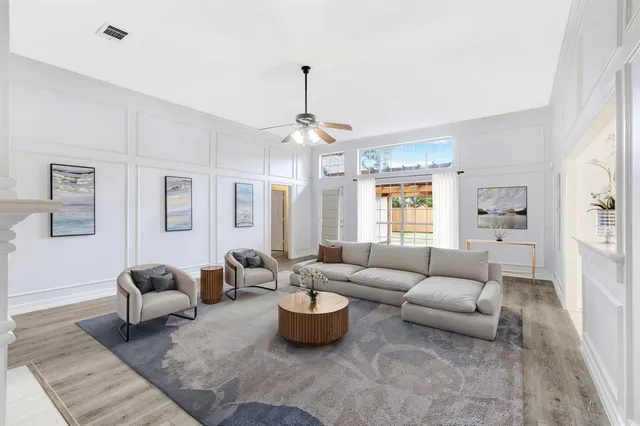 a living room with furniture or couch and a window