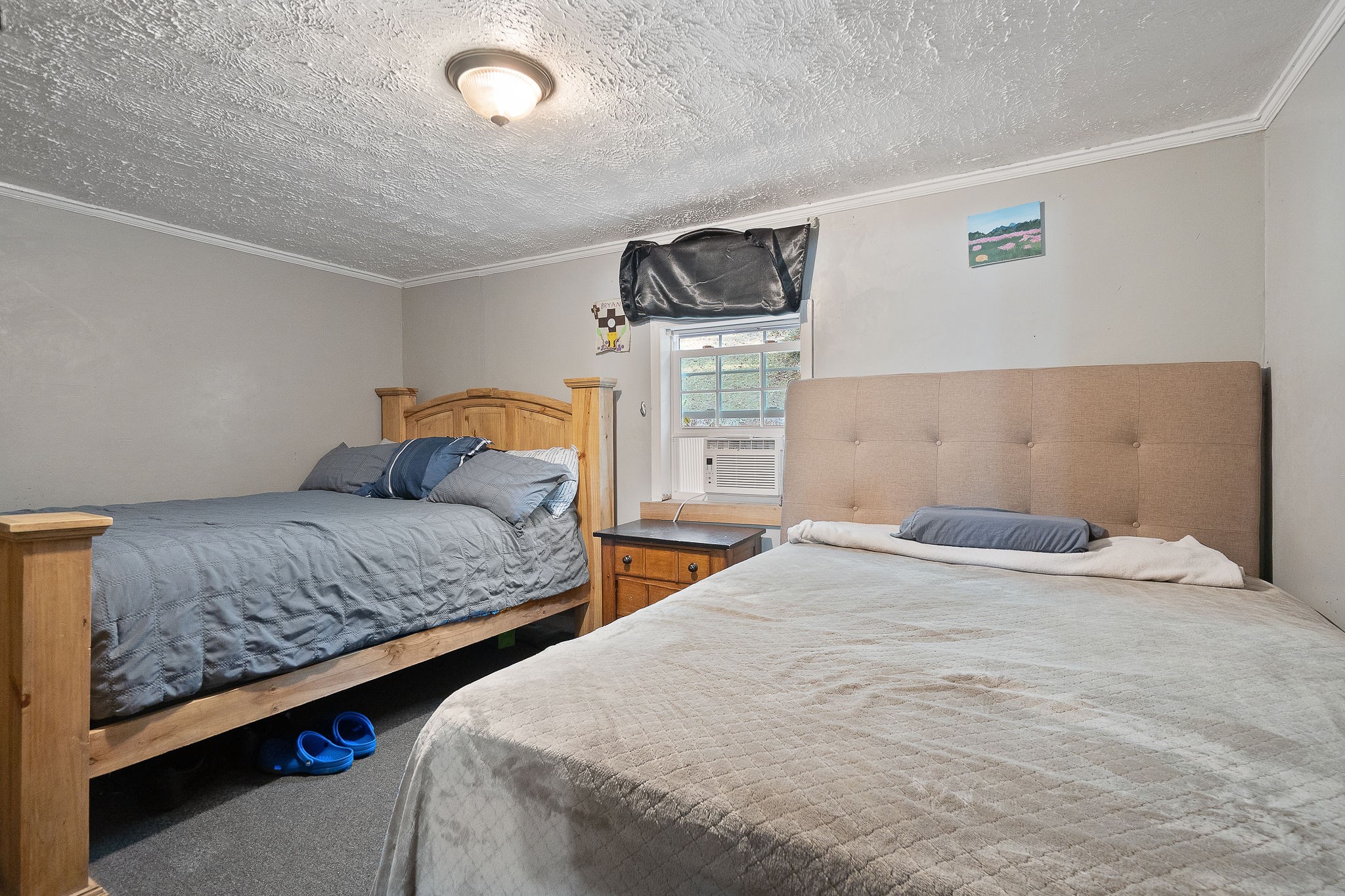 2184 Hyder Mountain Road Cookeville, TN 38506 - Photo 12 of 33 a bedroom with double bed and a couch