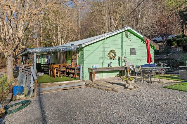a view of outdoor space with deck and garden