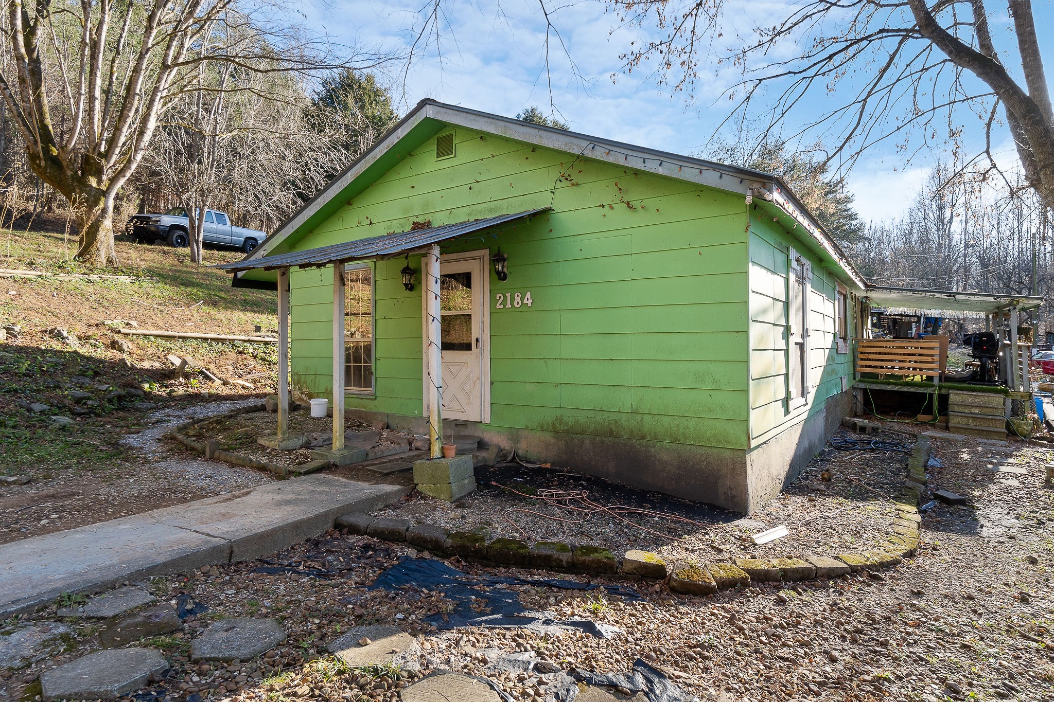 2184 Hyder Mountain Road Cookeville, TN 38506 - Photo 25 of 33 a front view of a house with a yard