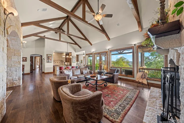 a view of a living room and dining area