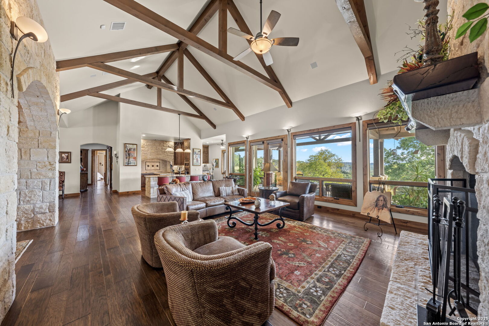 131 Bootlegger Lane North Kerrville, TX 78028 - Photo 12 of 50 a room with lots of furniture and wooden floor