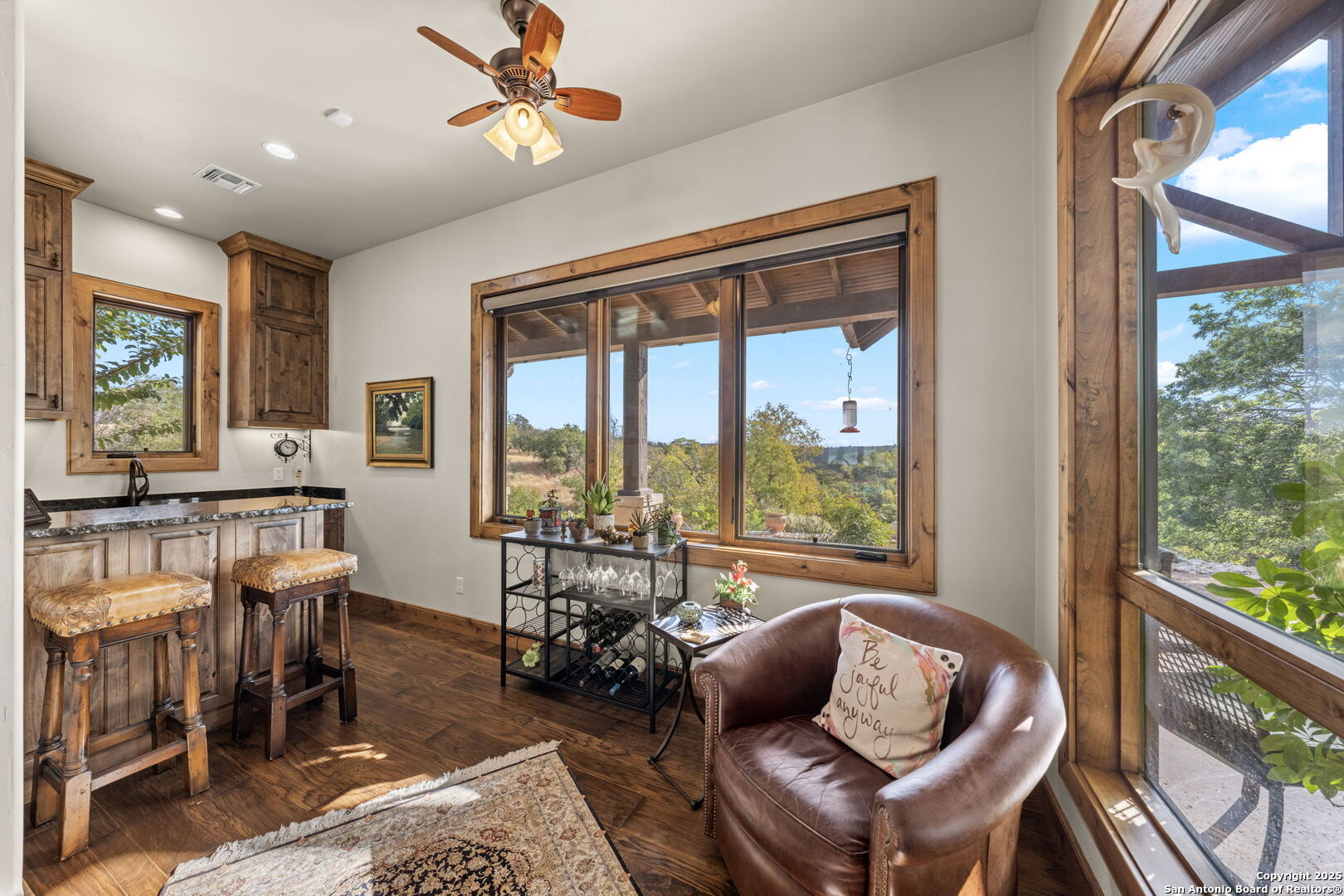 131 Bootlegger Lane North Kerrville, TX 78028 - Photo 16 of 50 a living room with furniture and a large window