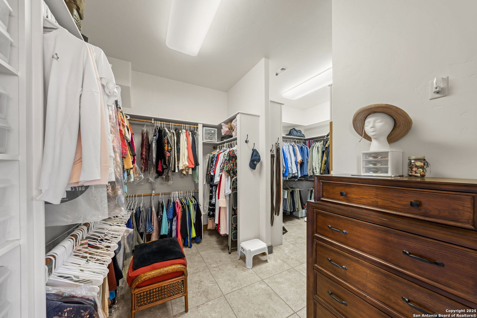 131 Bootlegger Lane North Kerrville, TX 78028 - Photo 22 of 50 a view of walk in closet with clothes and shoes