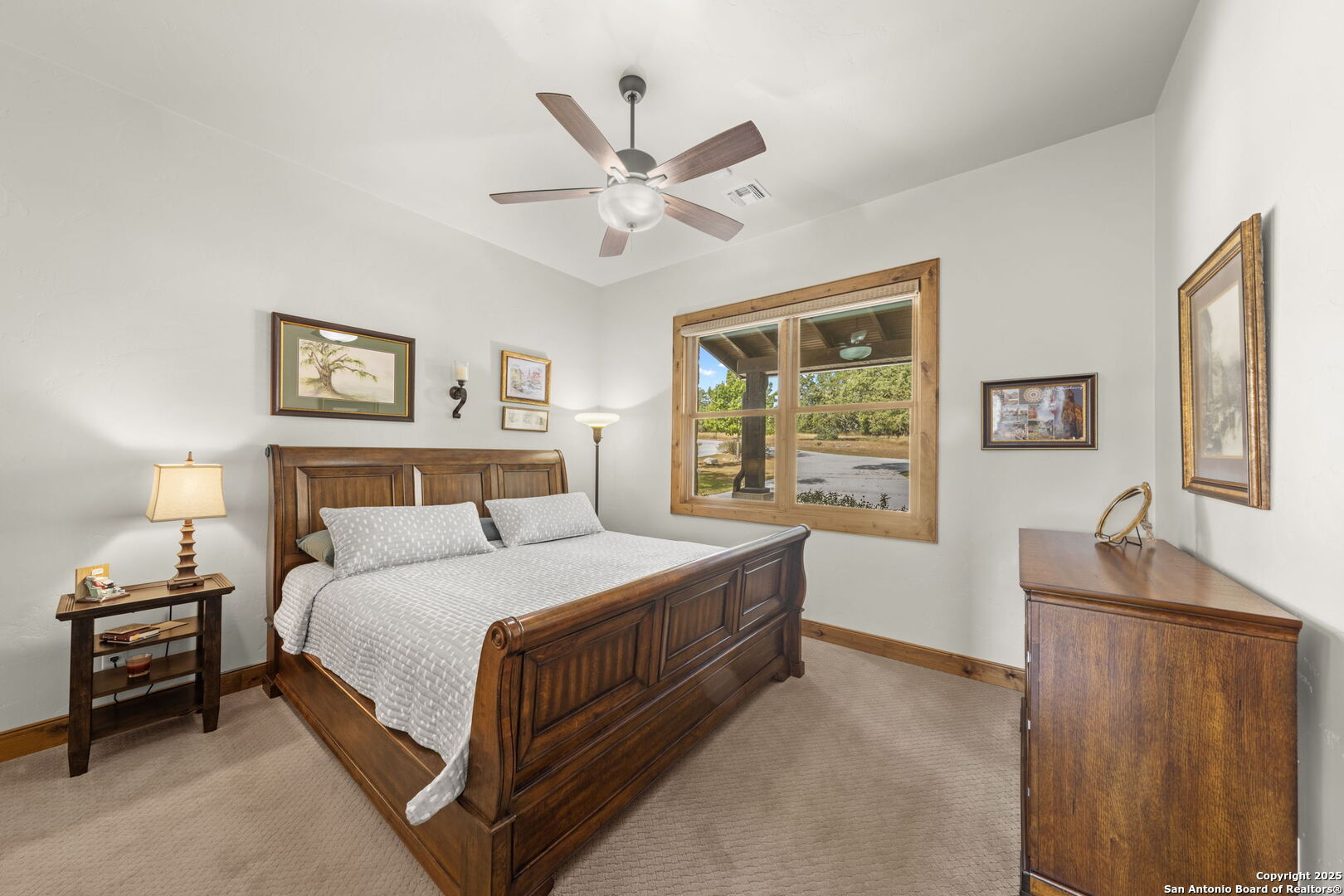 131 Bootlegger Lane North Kerrville, TX 78028 - Photo 28 of 50 a bedroom with a bed and window