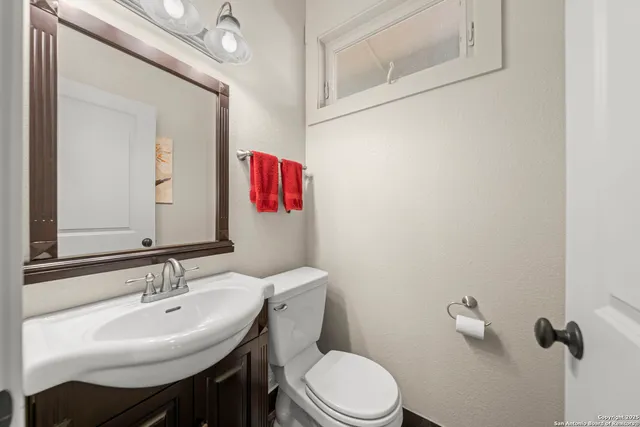 a view of a chairs and table in the balcony