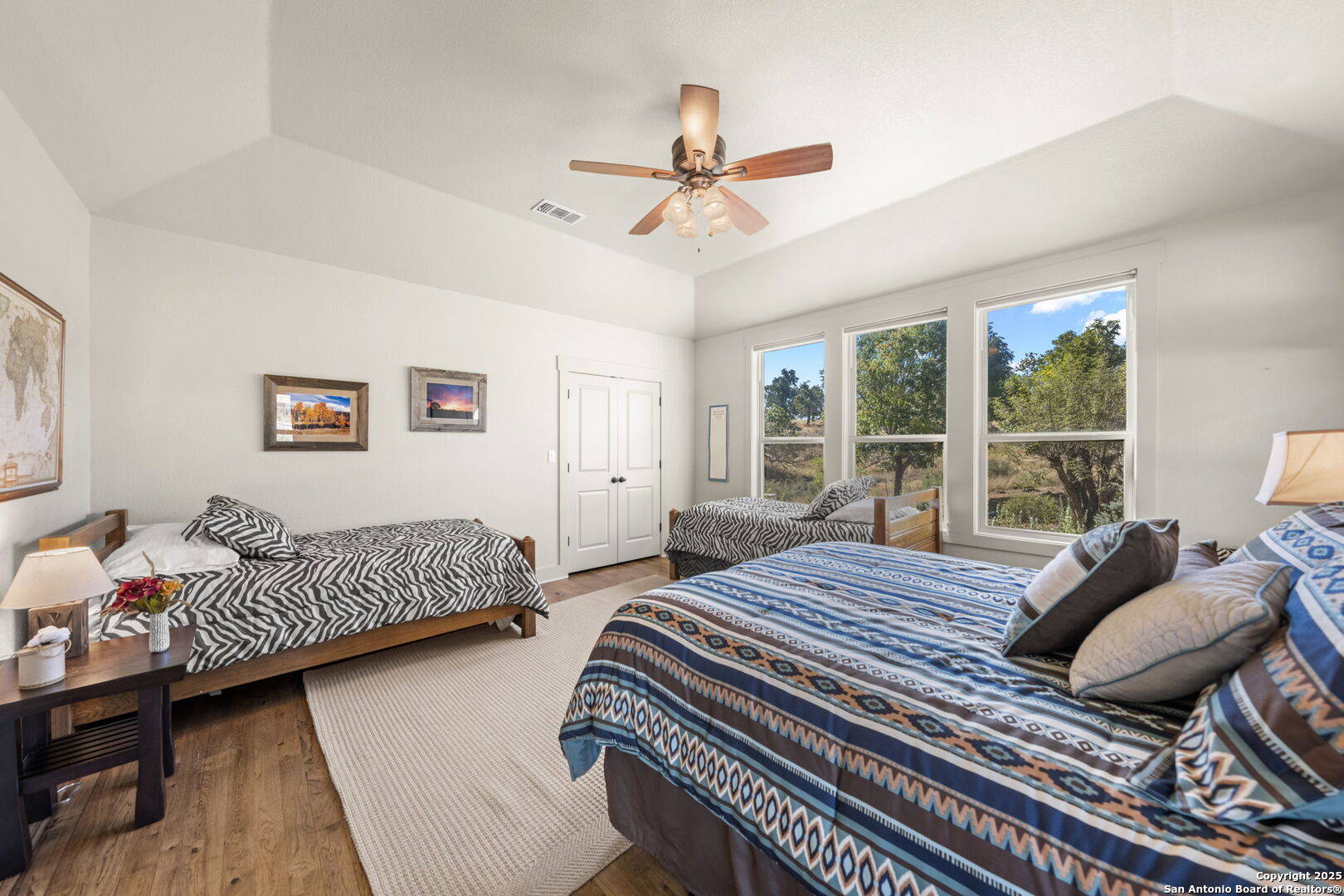 131 Bootlegger Lane North Kerrville, TX 78028 - Photo 43 of 50 a bedroom with bed and balcony