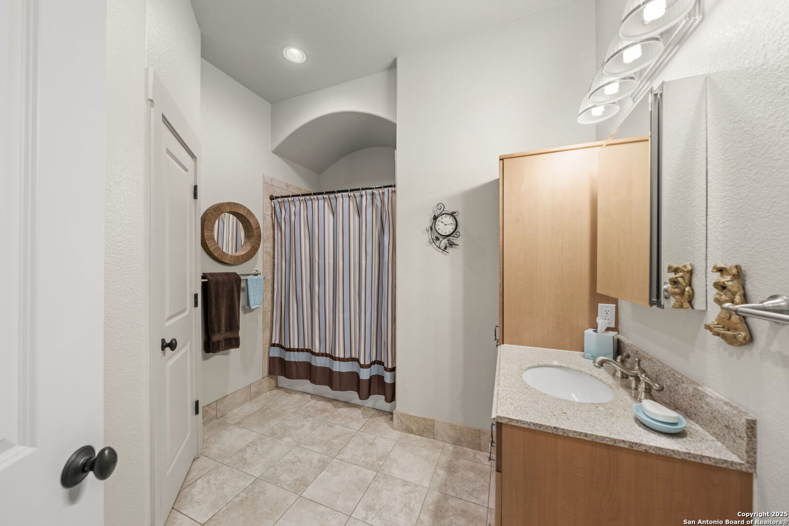131 Bootlegger Lane North Kerrville, TX 78028 - Photo 44 of 50 a bathroom with double vanity sink and a mirror
