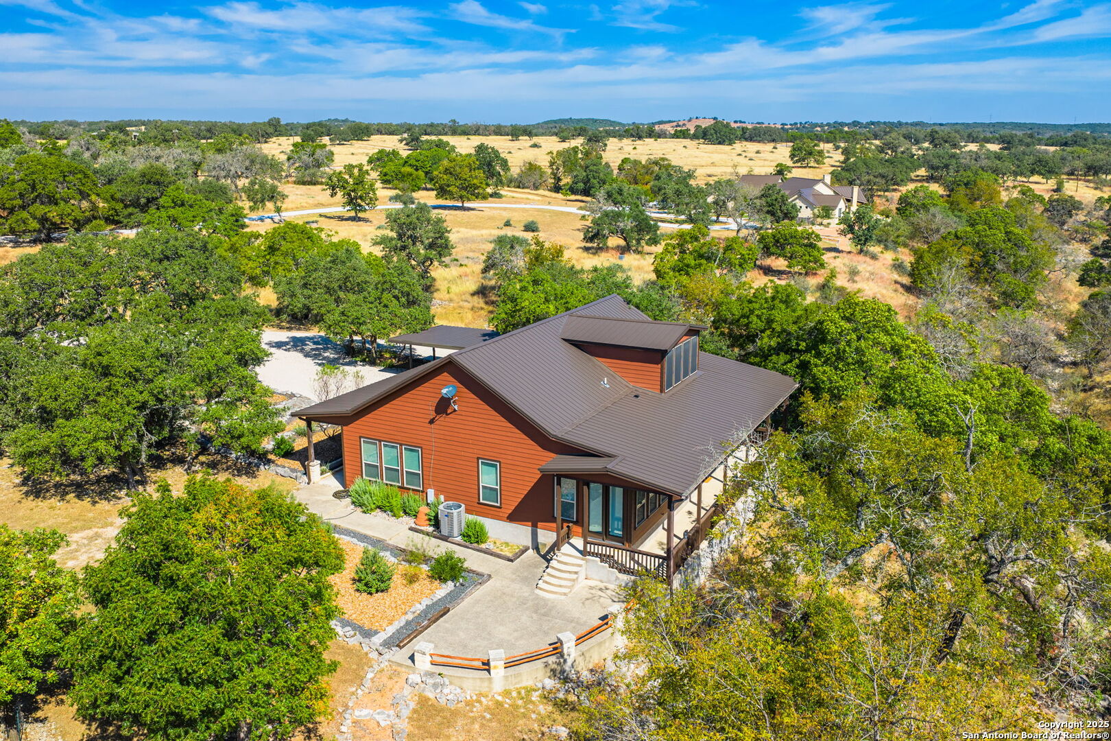 131 Bootlegger Lane North Kerrville, TX 78028 - Photo 45 of 50 an aerial view of residential houses with outdoor space and trees
